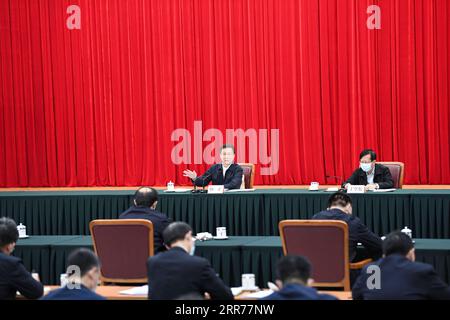 210317 -- BEIJING, March 17, 2021 -- Chinese Vice Premier Han Zheng, also a member of the Standing Committee of the Political Bureau of the Communist Party of China Central Committee, attends a symposium at the National Development and Reform Commission in Beijing, capital of China, March 16, 2021.  CHINA-BEIJING-HAN ZHENG-SYMPOSIUM CN YinxBogu PUBLICATIONxNOTxINxCHN Stock Photo