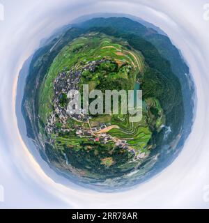 210319 -- DANZHAI, March 19, 2021 -- This 360-degree spherical panorama taken with a drone on March 19, 2021 shows a view of the Gaoyao terraced fields and Longquan Township of Danzhai County, southwest China s Guizhou Province.  CHINA-GUIZHOU-DANZHAI-TERRACED FIELD-SCENERY CN OuxDongqu PUBLICATIONxNOTxINxCHN Stock Photo