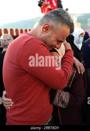 210319 -- NABLUS, March 19, 2021 -- Relatives of Palestinian Atef Yousef Hanaysha mourn during his funeral in the West Bank village of Beit Dajan, east of Nablus, on March 19, 2021. Atef Yousef Hanaysha was shot dead by Israeli soldiers on Friday afternoon in an anti-settlement rally near Beit Dajan village, medics said. Photo by /Xinhua MIDEAST-BEIT DAJAN-PALESTINIAN-FUNERAL AymanxNobani PUBLICATIONxNOTxINxCHN Stock Photo