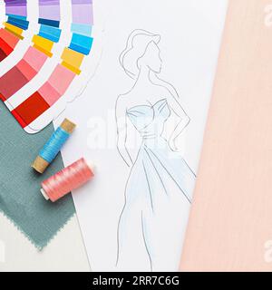 Top view sewing set with fabric samples thread Stock Photo