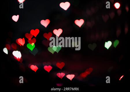 Heart shaped neon lights background Stock Photo