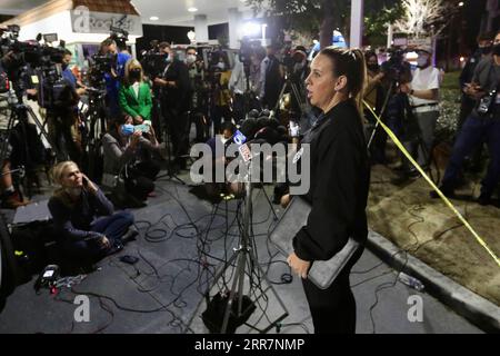 210401 -- ORANGE, April 1, 2021  -- Orange Police Department spokeswoman Lt. Jennifer Amat speaks to the media near the site of a shooting in the city of Orange, California, the United States, March 31, 2021. A shooting occurred Wednesday evening in the city of Orange, 55 km southeast of Los Angeles downtown, leaving at least four people dead and two others injured, local NBC news channel reported.  U.S.-CALIFORNIA-ORANGE-SHOOTING Xinhua PUBLICATIONxNOTxINxCHN Stock Photo