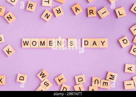 Women s day written scrabble letters Stock Photo