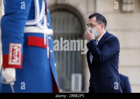 210414 -- BUCHAREST, April 14, 2021 -- Photo taken on March 23, 2021 shows Vlad Voiculescu in Bucharest, Romania. Romanian Prime Minister Florin Citu fired Health Minister Vlad Voiculescu on Wednesday, two days after the death of three COVID-19 patients due to oxygen failure in a mobile intensive care unit ICU in Bucharest. Voiculescu became the third health minister having been dismissed since the COVID-19 outbreak in Romania at the end of February last year. Photo by /Xinhua ROMANIA-BUCHAREST-COVID-19-HEALTH MINISTER SACKED CristianxCristel PUBLICATIONxNOTxINxCHN Stock Photo