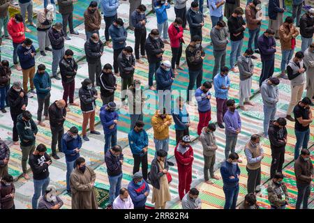 210414 -- SRINAGAR, April 14, 202-1 -- Muslims offer their prayers on the first day of the holy month of Ramadan in Srinagar city, the summer capital of Indian-controlled Kashmir, April 14, 2021.  KASHMIR-SRINAGAR-RAMADAN-PRAY JavedxDar PUBLICATIONxNOTxINxCHN Stock Photo