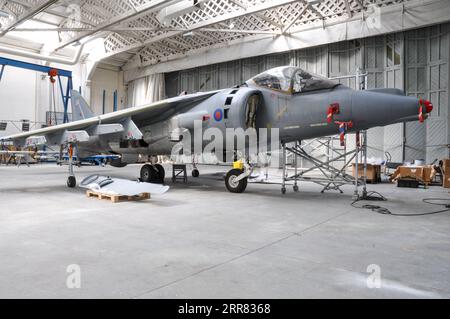 Retired Royal Air Force British Aerospace Harrier GR9 fighter jet plane ZD461 on display in a hangar at IWM Duxford, UK. BAe Systems Harrier GR.9 Stock Photo