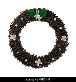 Mockup of dried tea leaves and fresh jasmine flowers shaped in round clock isolated on white background with clipping path Stock Photo