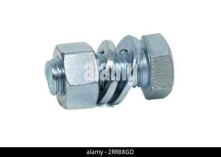 Full thread hexagon bolt and internal screw, flat nut washer and spring washer coated with a protective layer of zinc isolated on white background Stock Photo