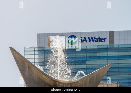 Adelaide, South Australia - September 27, 2019: Water fountain in front of SAWater main office building on Victoria Square on a day Stock Photo