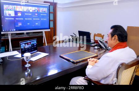 210505 -- COLOMBO, May 5, 2021 -- Sri Lankan Prime Minister Mahinda Rajapaksa attends the Asian Development Bank s 54th annual meeting which was held virtually, in Colombo, Sri Lanka, on May 5, 2021. Rajapaksa, who also serves as minister of finance, was on Wednesday elected chair of the Asian Development Bank s ADB Board of Governors for the year 2021/2022 during the bank s 54th annual meeting held virtually, a statement from Rajapaksa s office said. /Handout via Xinhua SRI LANKA-COLOMBO-PM-CHAIR OF ADB S BOARD OF GOVERNORS SrixLankanxPrimexMinister sxOffice PUBLICATIONxNOTxINxCHN Stock Photo