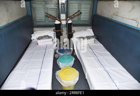 210506 -- GUWAHATI, May 6, 2021  -- A train car is seen converted into a COVID-19 care center at Guwahati railway station in Assam, India, May 5, 2021. India s COVID-19 tally surpassed 21 million on Thursday as 412,262 new cases were registered across the country in the past 24 hours, said federal health ministry. Str/ INDIA-COVID-19-DAILY LIFE Xinhua PUBLICATIONxNOTxINxCHN Stock Photo