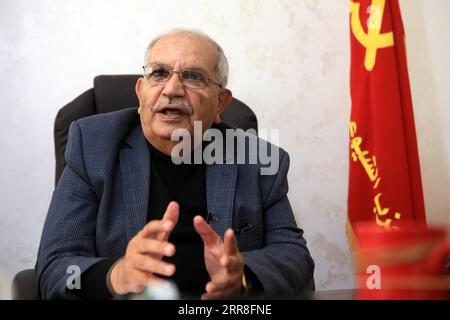 210506 -- AMMAN, May 6, 2021 -- Secretary General of Jordan s Communist Party Faraj Itmeiza speaks in an interview with Xinhua in Amman, Jordan, April 6, 2021. Upholding the people-centered philosophy, the Communist Party of China CPC has kept the Chinese people as the top priority and striven to serve them wholeheartedly, Itmeiza has said. TO GO WITH Interview: Jordanian communist party leader praises CPC s people-centered philosophy Photo by /Xinhua JORDAN-AMMAN-COMMUNIST PARTY LEADER-INTERVIEW MohammadxAbuxGhosh PUBLICATIONxNOTxINxCHN Stock Photo