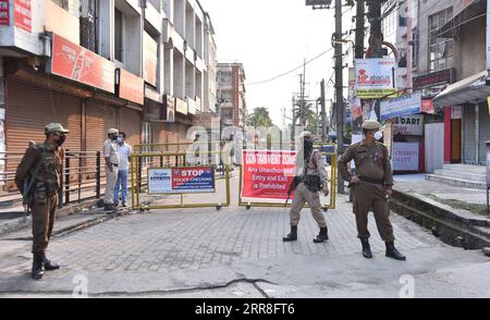 210506 -- GUWAHATI, May 6, 2021 -- Security guards keep a tight vigil in front of the containment zone of Beltora area of Guwahati in India s north eastern state of Assam on May 6, 2021. India s COVID-19 tally surpassed 21 million on Thursday as 412,262 new cases were registered across the country in the past 24 hours, the health miniy said. /Xinhua INDIA-GUWAHATI-COVID-19 Str PUBLICATIONxNOTxINxCHN Stock Photo