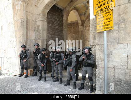 210510 -- JERUSALEM, May 10, 2021 -- Israeli police stand guard around the Al-Aqsa Mosque compound in Jerusalem on May 10, 2021. Israeli police and Palestinian worshipers clashed inside a flashpoint at a Jerusalem holy site on Monday morning, leaving at least dozens of Palestinians injured, according to the Palestinian Red Crescent. Israeli Police said in a statement that thousands of Palestinians rioted and hurled stones and other objects from the Al-Aqsa Mosque compound at police officers. Photo by /Xinhua MIDEAST-JERUSALEM-CLASHES MuammarxAwad PUBLICATIONxNOTxINxCHN Stock Photo