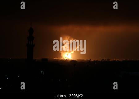 210511 -- GAZA, May 11, 2021 -- Photo taken on May 10, 2021 shows explosions following Israeli airstrikes in the southern Gaza Strip city of Rafah. Israel carried out airstrikes in the Gaza Strip, killing at least 20 people, as rocket fire from the Palestinian enclave continued through Monday night, according to Israeli and Palestinian sources. Photo by /Xinhua MIDEAST-RAFAH-ISRAEL-AIRSTRIKES KhaledxOmar PUBLICATIONxNOTxINxCHN Stock Photo