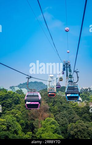 Singapore, August 14, 2023: Sentosa Cable Car is a gondola lift providing an aerial link from Mount Faber to the resort island of Sentosa. Stock Photo