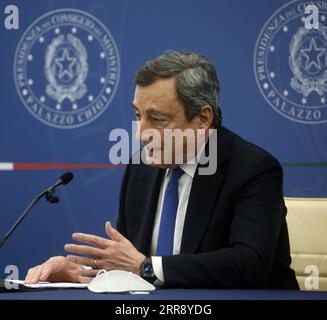 210520 -- ROME, May 20, 2021 -- Italian Prime Minister Mario Draghi speaks at a news conference in Rome, Italy, on May 20, 2021. The Italian government on Thursday approved a 40-billion-euro 48.9-billion-U.S. dollar relief package to support the country s businesses and workers affected by the COVID-19 restrictions. The new relief measures included 17 billion euros of financial aid to companies, and nine billion euros for business credit support, according to Prime Minister Mario Draghi. Str/Xinhua ITALY-ROME-PM-ECONOMY-STIMULUS Stringer PUBLICATIONxNOTxINxCHN Stock Photo