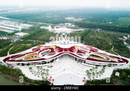 210521 -- SHANGHAI, May 21, 2021 -- Aerial photo taken on May 20, 2021 shows an overview of one of the main pavilions of the 10th China Flower Expo in Chongming District, east China s Shanghai. The 10th China Flower Expo, which covers a total area of 589 hectares, kicked off here on Friday and is expected to conclude on July 2.  CHINA-SHANGHAI-10TH FLOWER EXPOCN DingxTing PUBLICATIONxNOTxINxCHN Stock Photo