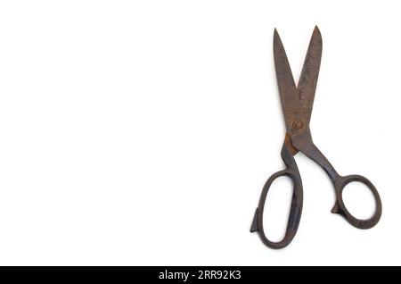 old and rusty scissors (around 1967) on white Background Stock Photo