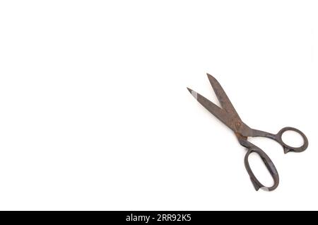 old and rusty scissors (around 1967) on white Background Stock Photo