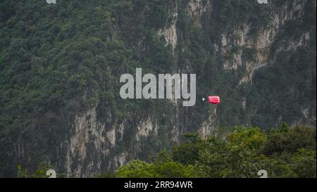 Liupanshui. 6th Sep, 2023. The aerial photo taken on Sept. 6, 2023 shows that an athlete takes part in the 2023 International High Bridge Extreme Sports Invitational Tournament in Liupanshui, southwest China's Guizhou Province. A total of 25 athletes from 11 countries and regions, including Italy, France, Canada and the United States, came to China's Beipanjiang Bridge to participate in the 2023 International High Bridge Extreme Sports Invitational Tournament. Credit: Tao Liang/Xinhua/Alamy Live News Stock Photo