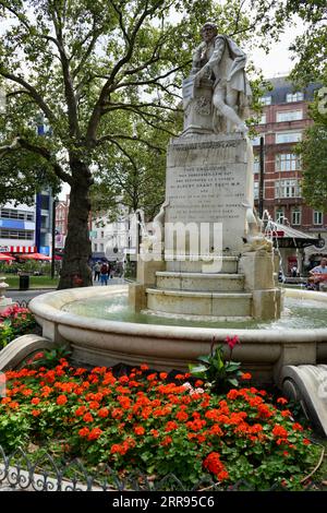 The statue of William Shakespeare and fountain in Leicester Square, London, UK. Stock Photo