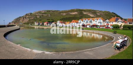 The boating lake and Great Orme at the West shore in Llandudno, North Wales. Stock Photo