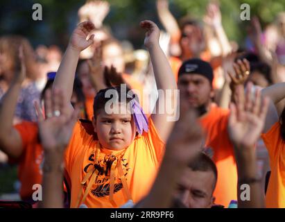 210627 -- OTTAWA, June 27, 2021 -- People participate in a gathering organized by local indigenous community to pay tribute to the 215 Indigenous children whose bodies were found in a mass grave at a former Kamloops residential school, at Grandview Park in Vancouver, Canada, June 2, 2021. Photo by /Xinhua Xinhua Headlines: Hundreds of unmarked graves unveil tip of Canada s genocidal history LiangxSen PUBLICATIONxNOTxINxCHN Stock Photo