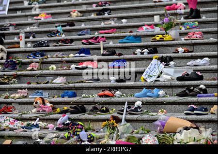 210627 -- OTTAWA, June 27, 2021 -- Children s shoes and toys are placed on the staircase outside Vancouver Art Gallery during a memorial event for the 215 children whose remains have been found buried at a former Kamloops residential school, in Vancouver, British Columbia, Canada, May 30, 2021. Photo by /Xinhua Xinhua Headlines: Hundreds of unmarked graves unveil tip of Canada s genocidal history AndrewxSoong PUBLICATIONxNOTxINxCHN Stock Photo