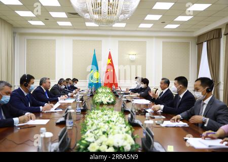 210717 -- TASHKENT, July 17, 2021 -- Visiting Chinese State Councilor and Foreign Minister Wang Yi holds talks with Kazakh Deputy Prime Minister and Foreign Minister Mukhtar Tleuberdi in Tashkent, Uzbekistan, July 15, 2021.  UZBEKISTAN-TASHKENT-KAZAKHSTAN-CHINA-WANG YI-TALKS CaixGuodong PUBLICATIONxNOTxINxCHN Stock Photo