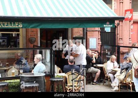 210726 -- DUBLIN, July 26, 2021 -- A customer is checked at the entrance of a dining pub before getting indoor services in Dublin, Ireland, on July 26, 2021. Restaurants, bars, cafes and food courts across Ireland were permitted from Monday to provide indoor services to customers who have been fully vaccinated against COVID-19 or have recovered from the disease in the past six months, as well as to children under 18 in their care, according to the Irish government s new guidelines. Photo by /Xinhua IRELAND-DUBLIN-COVID-19-INDOOR HOSPITALITY-REOPENING LiuxXiaoming PUBLICATIONxNOTxINxCHN Stock Photo