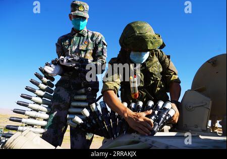 210805 -- YINCHUAN, Aug. 5, 2021 -- Military personnel prepare equipment for a joint military drill by the Chinese and Russian armies on Aug. 5, 2021. A joint military exercise by the Chinese and Russian armies will be held from Aug. 9 to 13 at a training base of the People s Liberation Army PLA in northwest China s Ningxia Hui Autonomous Region. TO GO WITH Chinese, Russian militaries to hold joint drill in NW China Photo by /Xinhua CHINA-RUSSIA-MILITARIES-JOINT DRILL-PREPARATION CN DingxKai PUBLICATIONxNOTxINxCHN Stock Photo