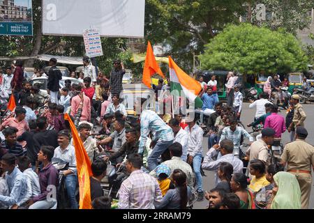 Rajkot, India. 7th September, 2023. Crowd enjoying possession of shri krishna janmashtami at sadar bazar rajkot. Credit: Nasirkhan Davi/Alamy Live News Stock Photo