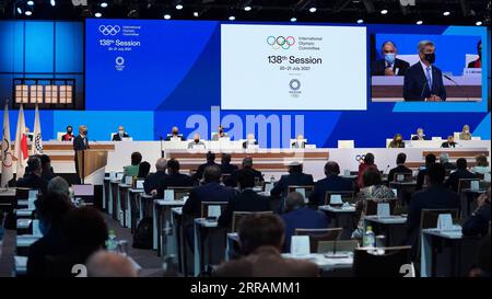 210808 -- TOKYO, Aug. 8, 2021  -- Members of the International Olympic Committee IOC attend the 138th IOC Session in Tokyo, Japan, on July 20, 2021. IOC/Handout via  Headlines: Athletes unite to go Faster, Higher, Stronger - Together at Tokyo Games XINHUA PUBLICATIONxNOTxINxCHN Stock Photo