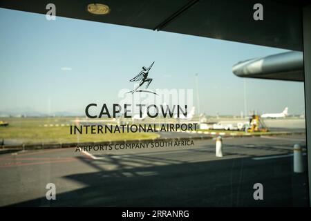 210811 -- CAPE TOWN, Aug. 11, 2021 -- The logo of Cape Town International Airport is pictured on a window at Cape Town International Airport, South Africa, Aug. 6, 2021. Cape Town International Airport has won the 2021 Best Airport in Africa Award for the sixth consecutive year at the annual Skytrax World Airport Awards, the airport said Tuesday.  SOUTH AFRICA-CAPE TOWN-AIRPORT-AWARD LyuxTianran PUBLICATIONxNOTxINxCHN Stock Photo