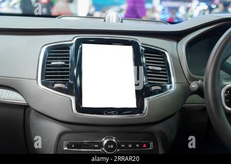 Futuristic driving unfolds on the pristine canvas of a digital dashboard. White mockup screen hints at a realm of customizable possibilities. Stock Photo
