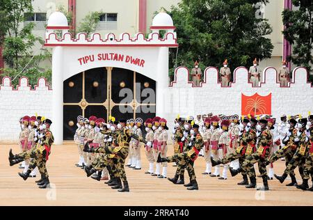 210815 -- BANGALORE, Aug. 15, 2021 -- Indian Police and Border Security Force BSF personnel march during India s Independence Day celebrations at the Manek Shaw Parade Grounds, in Bangalore, India, Aug. 15, 2021. Str/Xinhua INDIA-BANGALORE-INDEPENDENCE DAY CELEBRATIONS Stringer PUBLICATIONxNOTxINxCHN Stock Photo