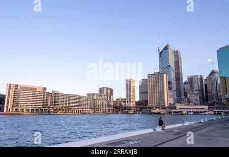 210820 -- SYDNEY, Aug. 20, 2021 -- A man rests at Circular Quay in Sydney, Australia, Aug. 20, 2021. Australia s most populous state of New South Wales NSW, the epicenter of the country s current COVID outbreak, announced Friday to extend the lockdown on Greater Sydney until the end of September and to impose a curfew on some areas of concern.  AUSTRALIA-SYDNEY-EXTENDED LOCKDOWN BaixXuefei PUBLICATIONxNOTxINxCHN Stock Photo