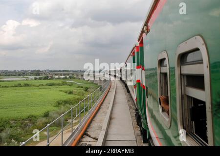 Munshiganj, Bangladesh - September 07, 2023: A special train operated by Bangladesh Railway on a test run on the 82-km Dhaka-Bhanga line via the Padma Stock Photo