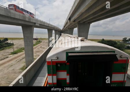 Munshiganj, Bangladesh - September 07, 2023: A special train operated by Bangladesh Railway on a test run on the 82-km Dhaka-Bhanga line via the Padma Stock Photo