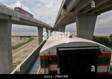 Munshiganj, Bangladesh - September 07, 2023: A special train operated by Bangladesh Railway on a test run on the 82-km Dhaka-Bhanga line via the Padma Stock Photo