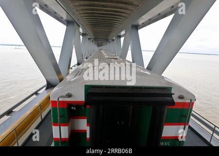 Munshiganj, Bangladesh - September 07, 2023: A special train operated by Bangladesh Railway on a test run on the 82-km Dhaka-Bhanga line via the Padma Stock Photo