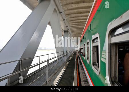 Munshiganj, Bangladesh - September 07, 2023: A special train operated by Bangladesh Railway on a test run on the 82-km Dhaka-Bhanga line via the Padma Stock Photo