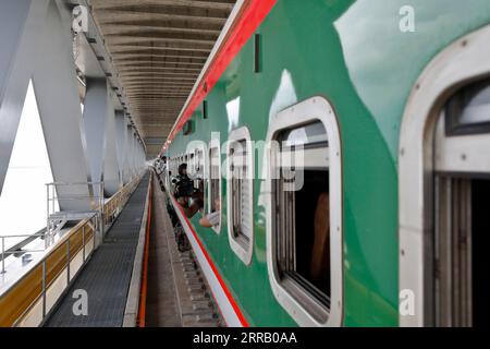 Munshiganj, Bangladesh - September 07, 2023: A special train operated by Bangladesh Railway on a test run on the 82-km Dhaka-Bhanga line via the Padma Stock Photo