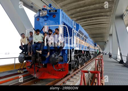 Munshiganj, Bangladesh - September 07, 2023: A special train operated by Bangladesh Railway on a test run on the 82-km Dhaka-Bhanga line via the Padma Stock Photo