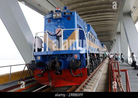 Munshiganj, Bangladesh - September 07, 2023: A special train operated by Bangladesh Railway on a test run on the 82-km Dhaka-Bhanga line via the Padma Stock Photo