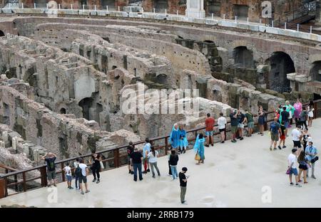 210825 -- ROME, Aug. 25, 2021 -- Tourists visit the hypogeum area of the Colosseo in Rome, Italy, on Aug. 24, 2021. The hypogeum area of the Colosseo, containing underground tunnels and rooms where gladiators and wild animals once prepared for battle, was accessible for visitors from June this year.  ITALY-ROME-COLOSSEO-UNDERGROUND AREA JinxMamengni PUBLICATIONxNOTxINxCHN Stock Photo