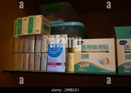 210827 -- NANCHANG, Aug. 27, 2021 -- Photo taken on Aug. 23, 2021 shows medical supplies used by Wang Lei, in east China s Jiangxi Province. Wang Lei, 39, took her doctor s degree in clinical medicine in 2011 and then worked in the neurology department of a hospital in Nanchang. One day in 2012, Wang, who was pregnant, fainted from dizziness after work. She has suffered from paralysis since then due to a large brain stem hemorrhage. With the help of her parents and the hospital, Wang began rehabilitation training after giving birth. At first, her muscles atrophied, and Wang could only lie in b Stock Photo