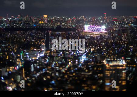 News Bilder des Tages 210905 -- TOKYO, Sept. 5, 2021 -- Fireworks explode over the Olympic Stadium during the closing ceremony of Tokyo 2020 Paralympic Games in Tokyo, Japan, Sept. 5, 2021.  TOKYO2020JAPAN-TOKYO-PARALYMPICS-CLOSING CEREMONY XiongxQi PUBLICATIONxNOTxINxCHN Stock Photo