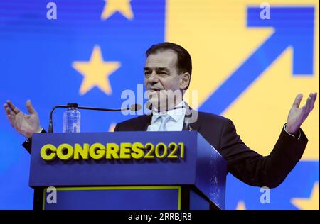 210926 -- BUCHAREST, Sept. 26, 2021 -- Incumbent Chairman of National Liberal Party PNL and Speaker of the Chamber of Deputies Ludovic Orban addresses PNL Congress in Bucharest, Romania, Sept. 25, 2021. Romanian Prime Minister Florin Citu was elected Saturday Chairman of the main ruling National Liberal Party PNL at the party congress. Citu, 49, won 60.2 percent of the votes in the voting of nearly 5,000 delegates from around the country, defeating incumbent Chairman and Speaker of the Chamber of Deputies Ludovic Orban who sought a new mandate. Photo by /Xinhua ROMANIA-BUCHAREST-PNL-NEW CHAIRM Stock Photo